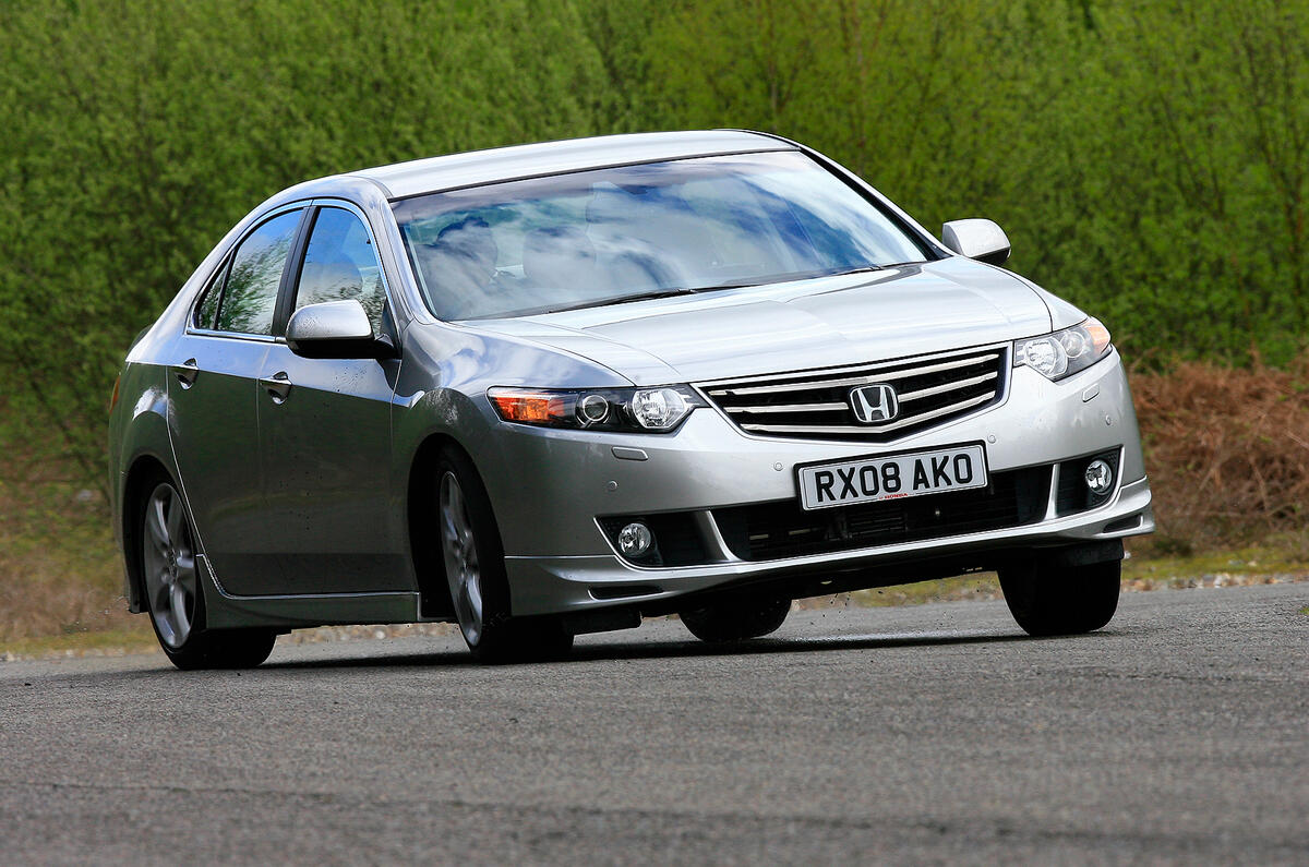 New Accord may have excellent road manners, but that rear suspension intrudes into the boot  Honda Accord hard cornering