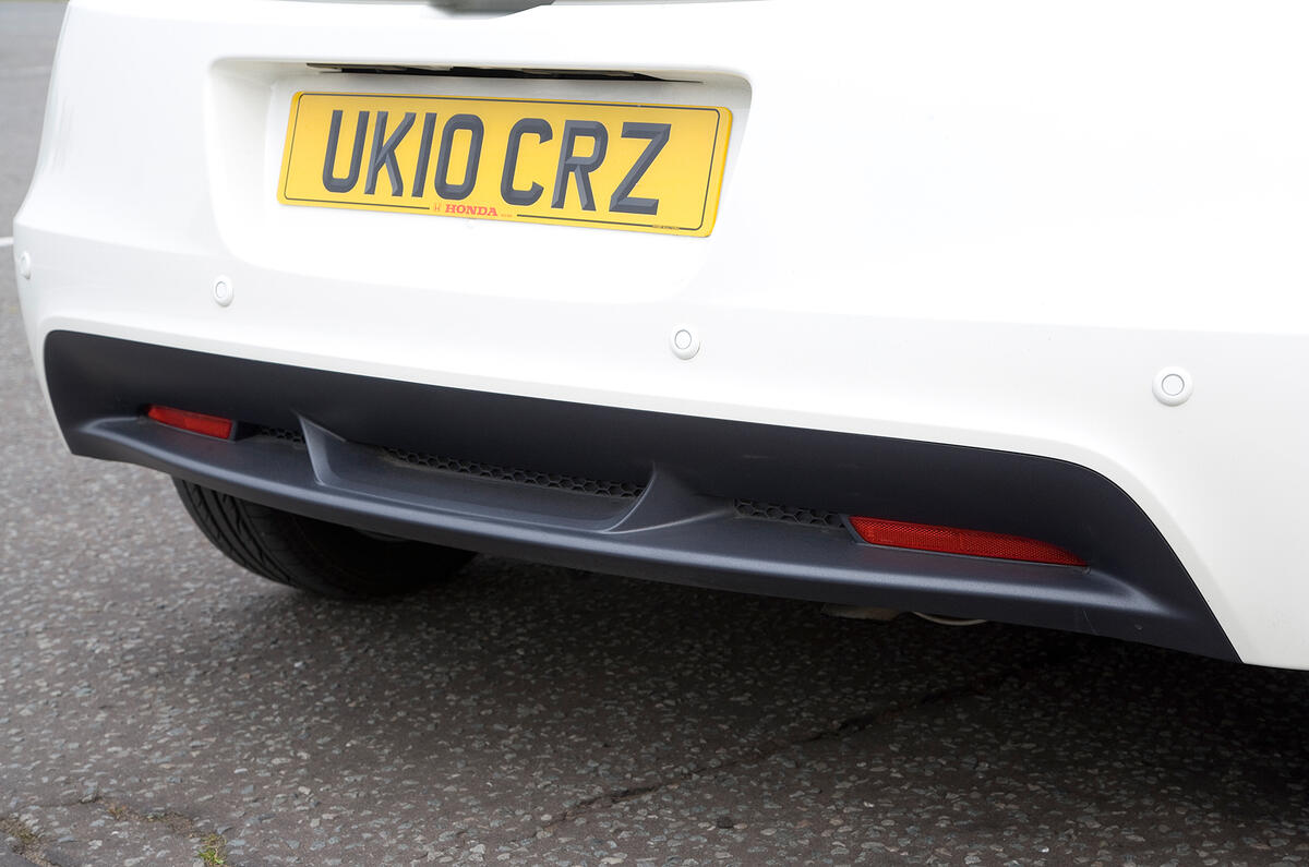 Rear diffuser hides the exhaust, which exits meekly beneath the plastic Honda CR-Z rear diffuser
