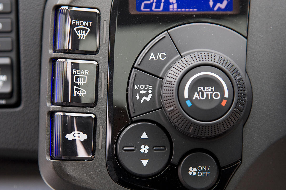 The switchgear design incorporates all sorts of shapes; it's far from uniform Honda CR-Z switchgear