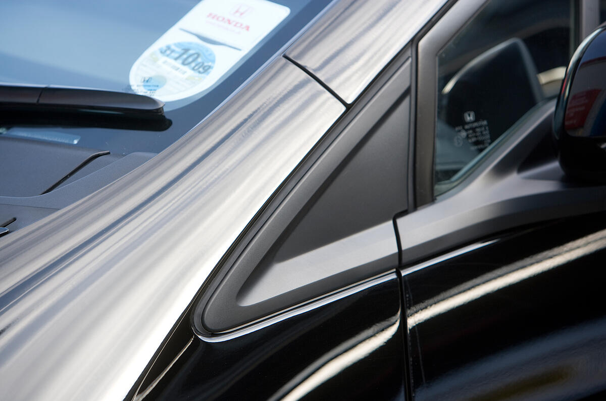 With aerodynamics dictating steeply sloped A-pillars, the Insight’s small windows ahead of the wing mirror helps with visibility Honda Insight aerodynamics