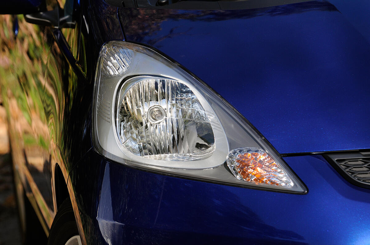 The headlights run almost the entire length of the bonnet Honda Jazz headlight