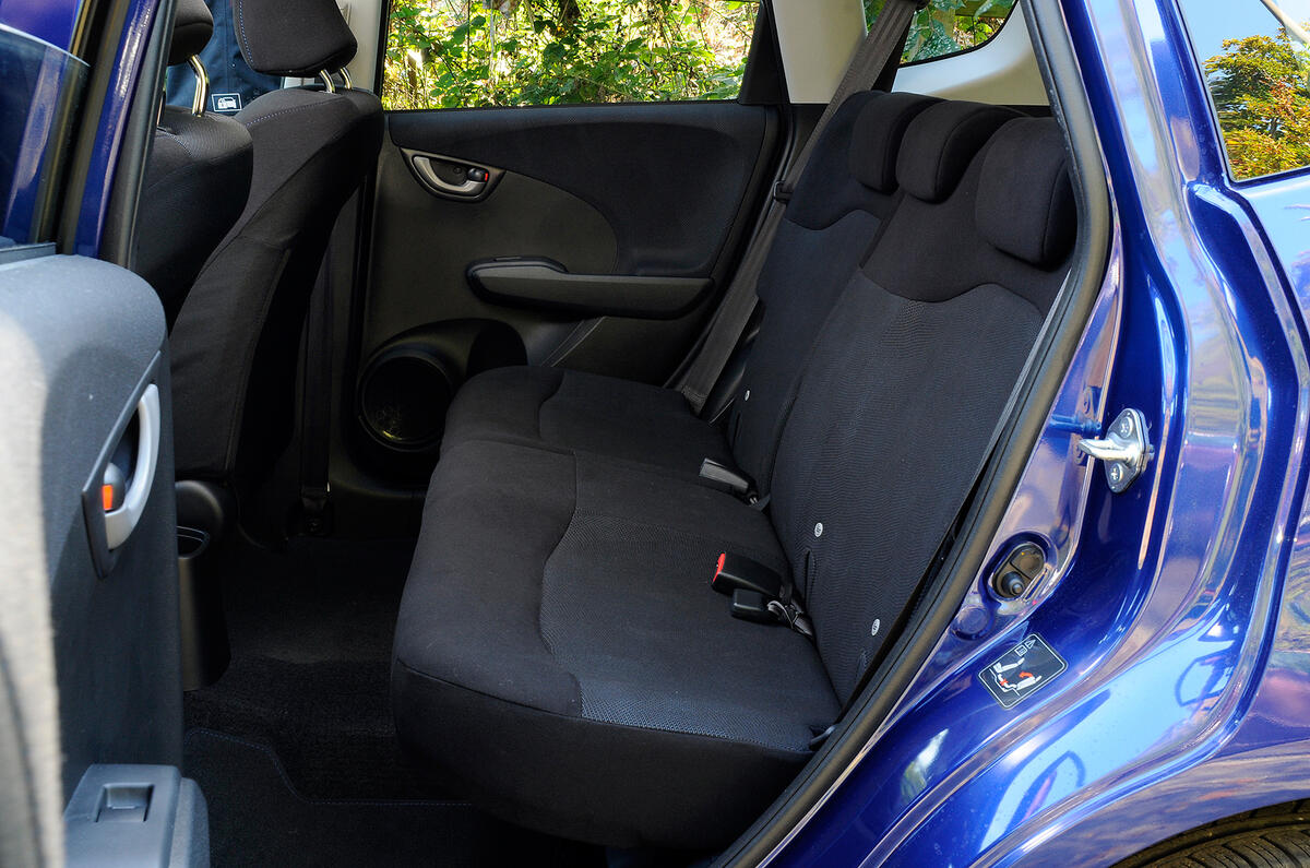 Leg and headroom is excellent for a supermini; the cabin is light, spacious and airy Honda Jazz rear seats
