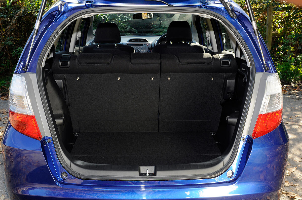 Apparently ordinary boot floor hinges and lifts to create a two-tier cargo bay Honda Jazz boot space