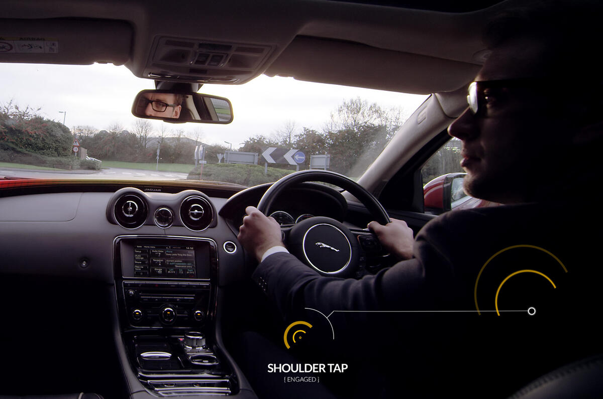 The top of the car seat will extend to &quot;tap&quot; the driver on the left or right shoulder, depending which side the hazard is