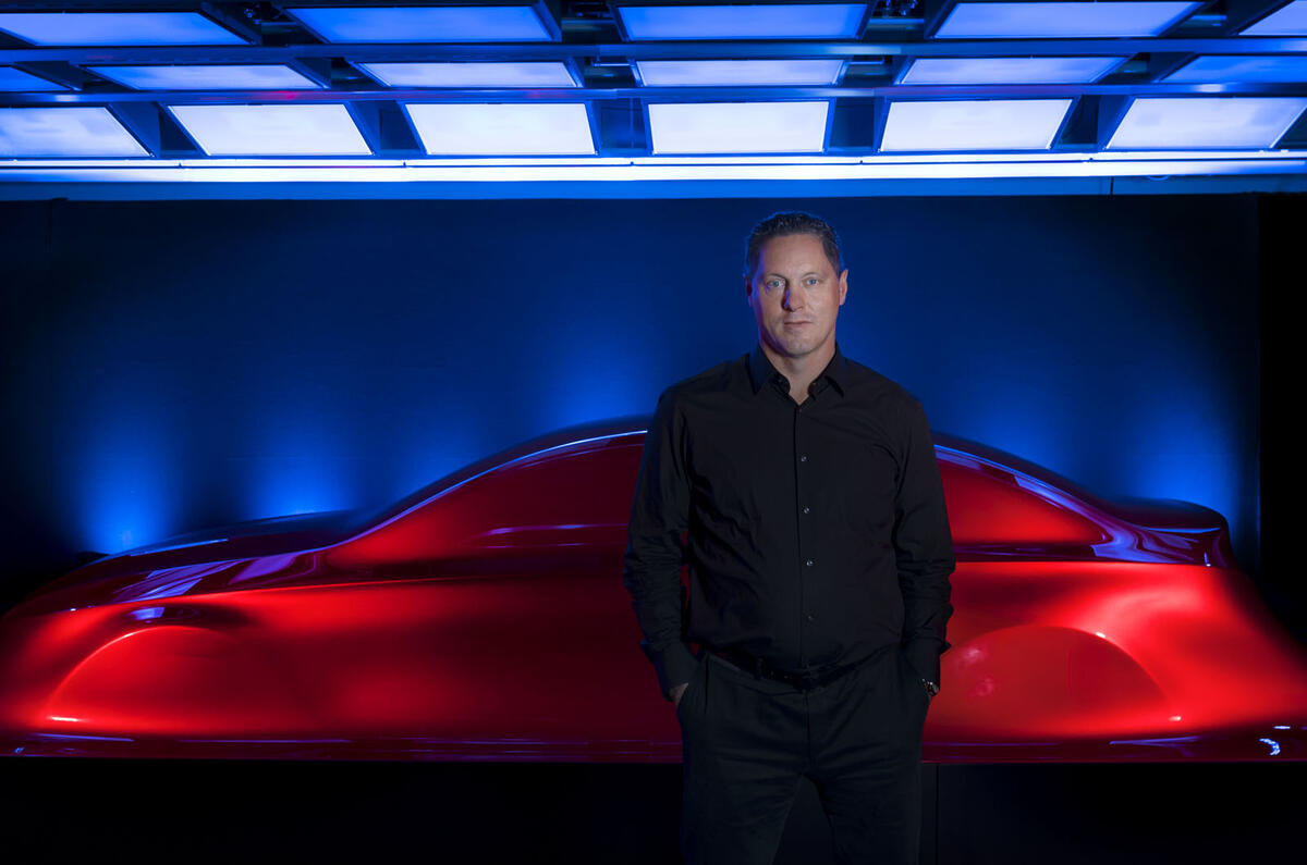 Gorden Wagener, Mercedes-Benz’s chief design officer standing before the Aesthetics A sculpture