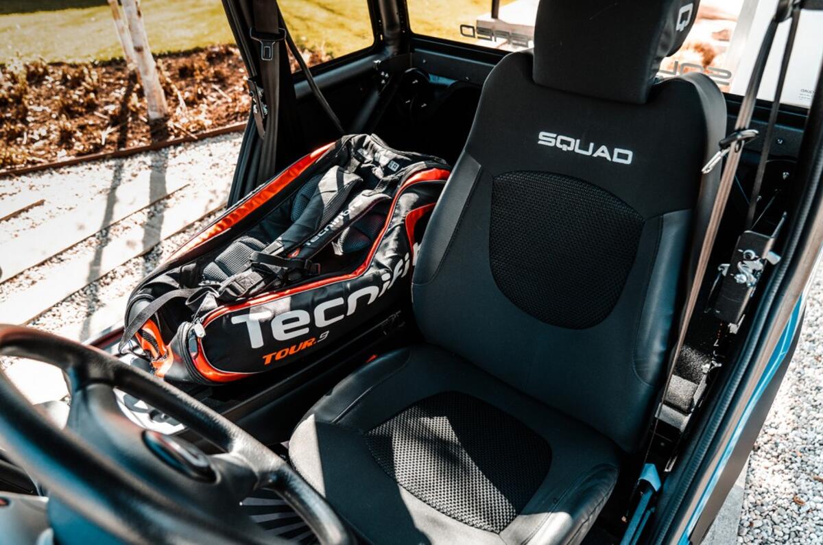 1 Squad Solar City Car seat folded down tennis bag 1 Squad Solar City Car seat folded down tennis bag