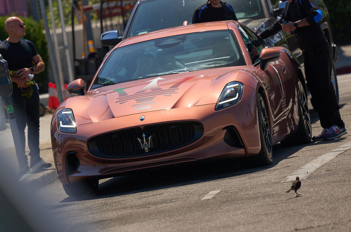 2022 Maserati Granturismo charging at Pebble beach (1) (1) 2022 Maserati Granturismo charging at Pebble beach (1) (1)