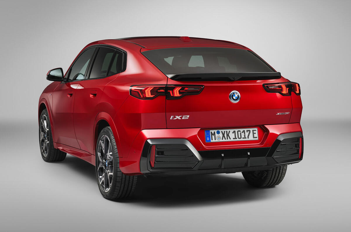 2024 BMW iX2 rear quarter studio 2024 BMW iX2 rear quarter studio