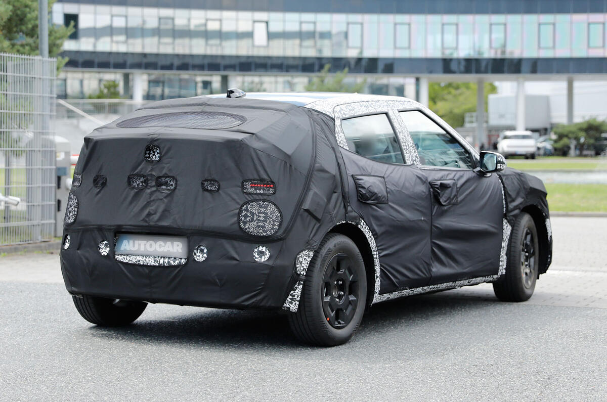 2026 Hyundai Ioniq 2 camo rear quarter 2026 Hyundai Ioniq 2 camo rear quarter
