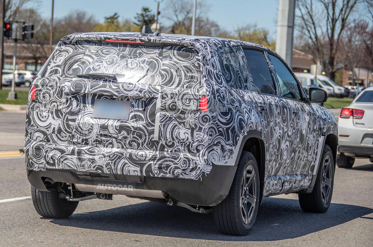 2026 Jeep Cherokee camo rear quarter 2026 Jeep Cherokee camo rear quarter