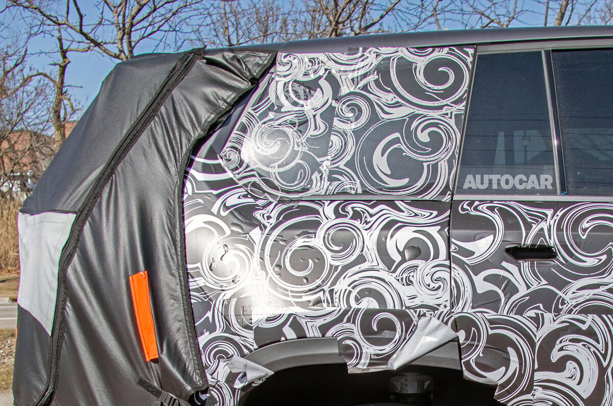 2026 Jeep Cherokee ICE camo rear quarter close 2026 Jeep Cherokee ICE camo rear quarter close