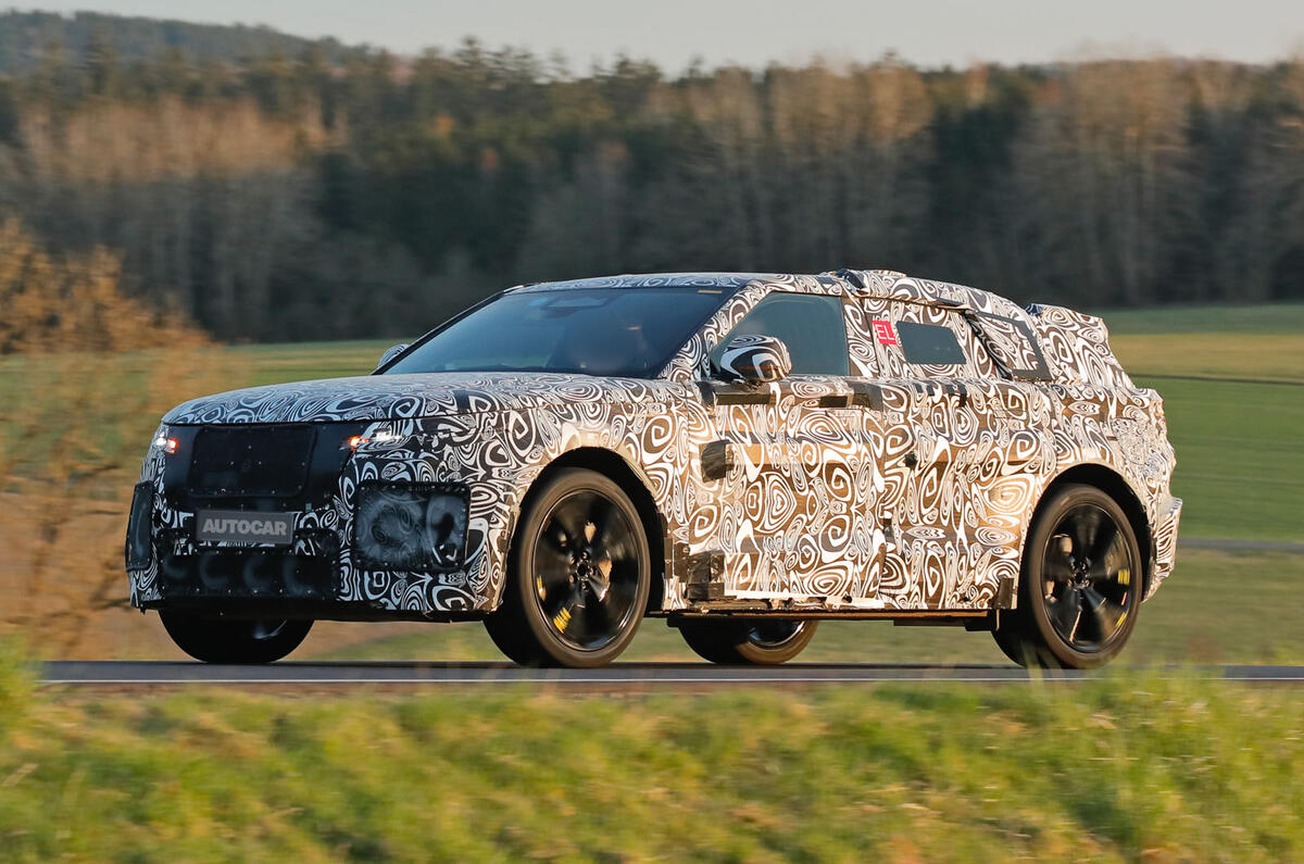 2026 Range Rover Velar EV testing camo front quarter tracking 2026 Range Rover Velar EV testing camo front quarter tracking