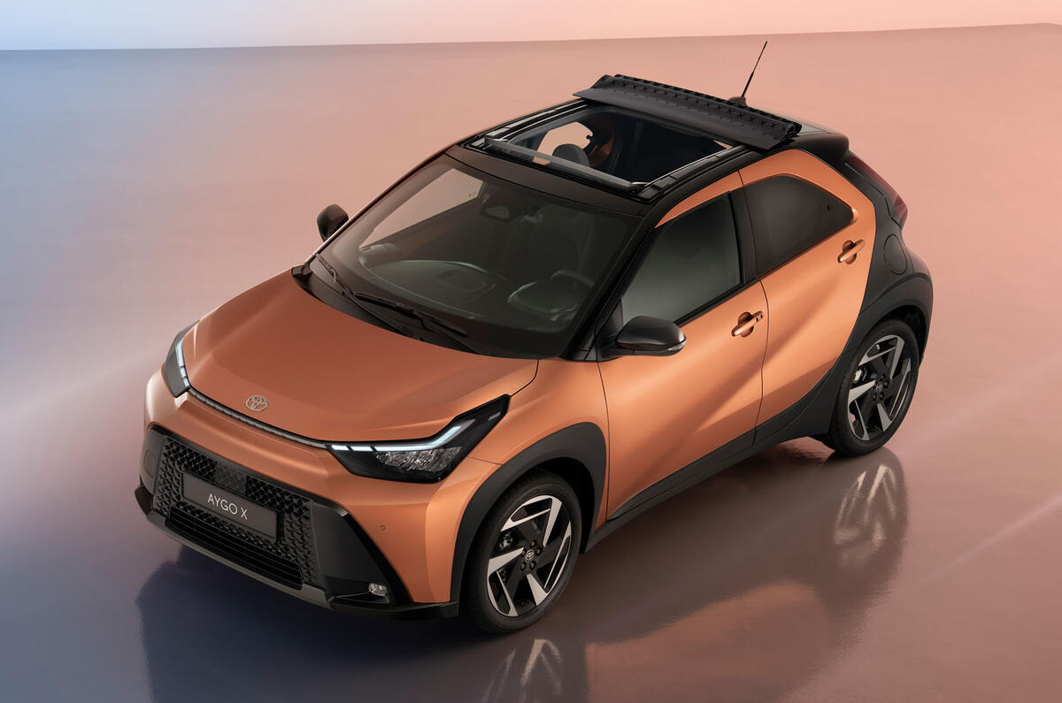 2026 Toyota Aygo X bronze front quarter static roof open 2026 Toyota Aygo X bronze front quarter static roof open