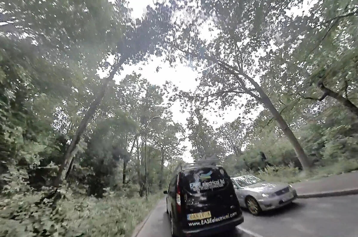 Back to the helmet-cam, and a scene familiar to cyclists as the e-scooter is overtaken in a tight spot Back to the helmet-cam, and a scene familiar to cyclists as the e-scooter is overtaken in a tight spot
