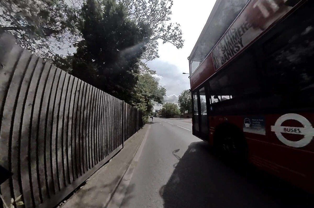 Helmet-cam reveals some of the scarier aspects of using an e-scooter - here a bus passes by Helmet-cam reveals some of the scarier aspects of using an e-scooter - here a bus passes by