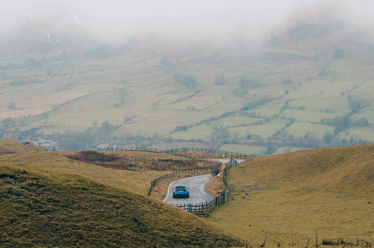 72 BMW M3 vs Audi RS3 saloon 2021 M3 driving away