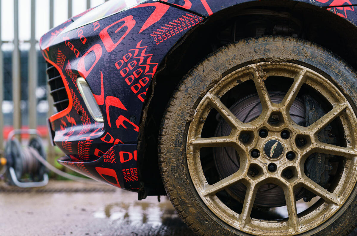 2020 Aston Martin DBX camouflaged prototype ride - muddy wheels