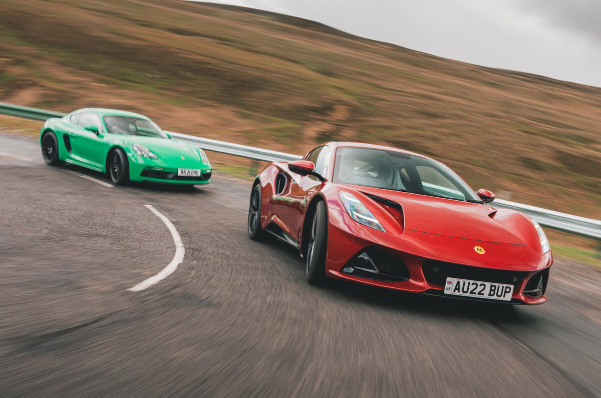 77 porsche 718 cayman gts 40 lotus emira cornering 77 porsche 718 cayman gts 40 lotus emira cornering