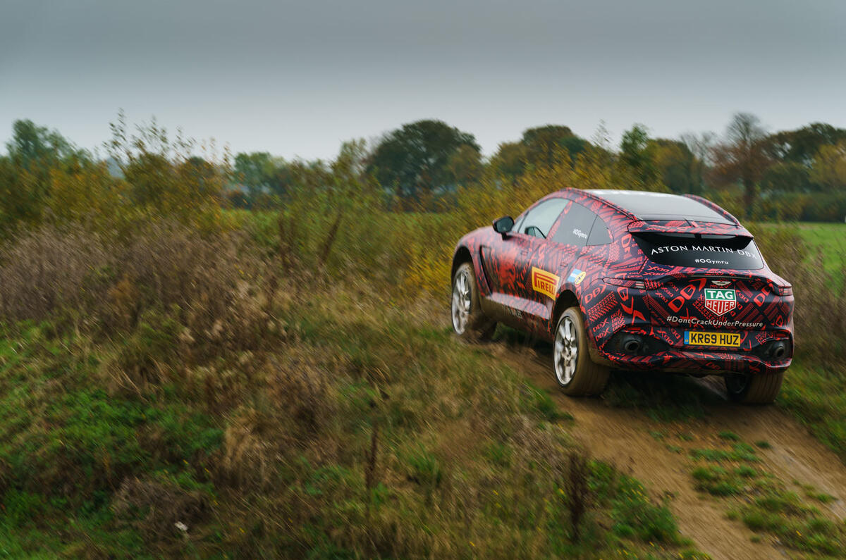 2020 Aston Martin DBX camouflaged prototype ride - hill