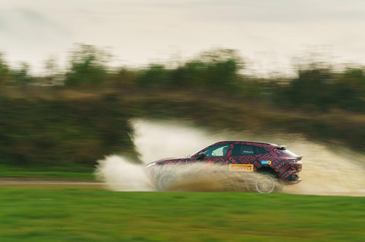 2020 Aston Martin DBX camouflaged prototype ride - splash