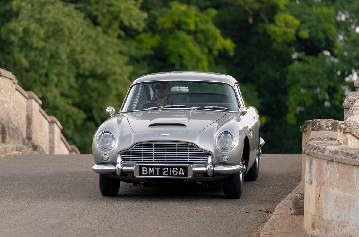 80 Aston Martin DB5 Goldfinger road test 2021 on road front 80 Aston Martin DB5 Goldfinger road test 2021 on road front