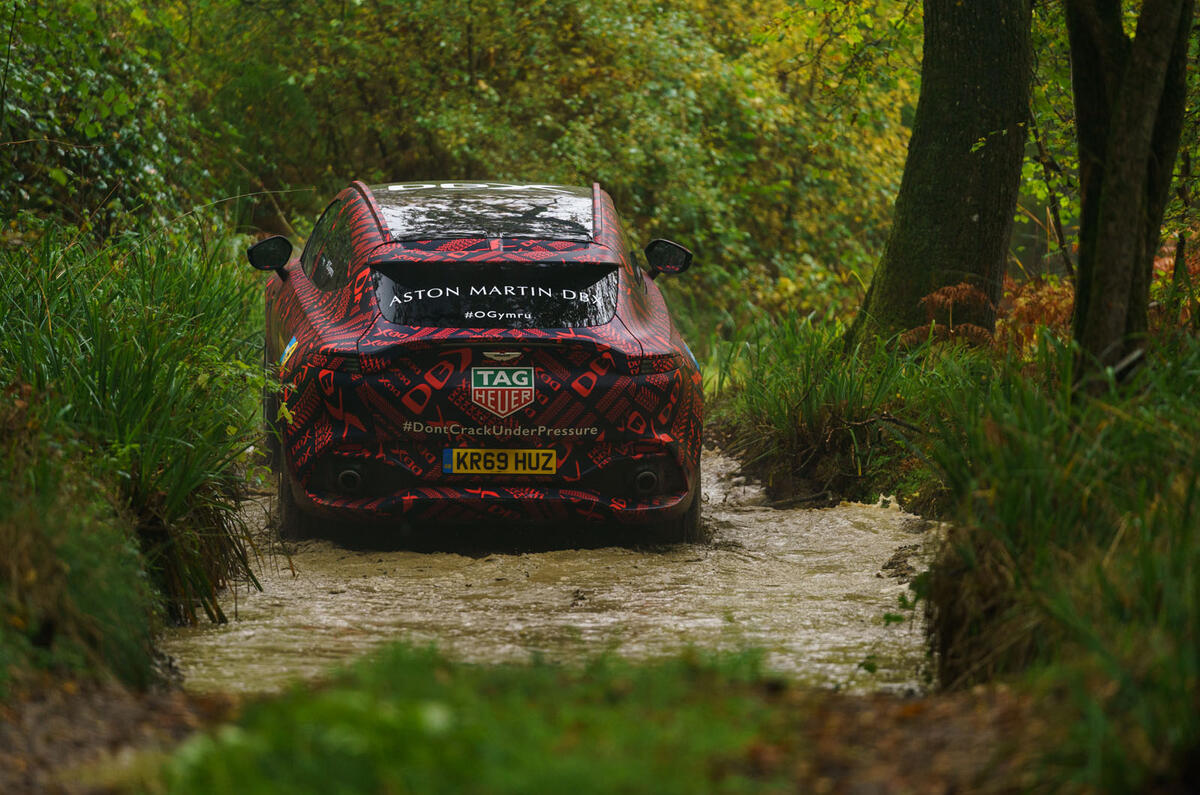 2020 Aston Martin DBX camouflaged prototype ride - off-road rear