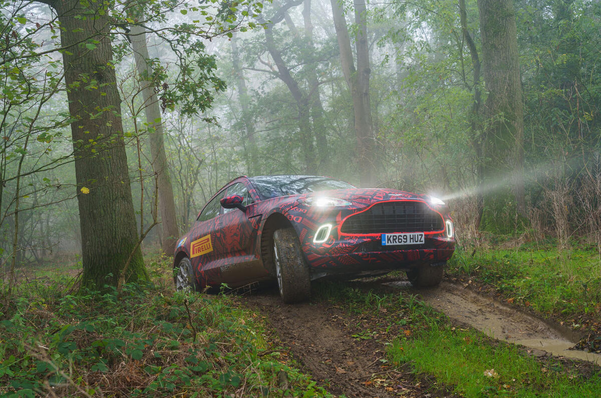 2020 Aston Martin DBX camouflaged prototype ride - off-road front
