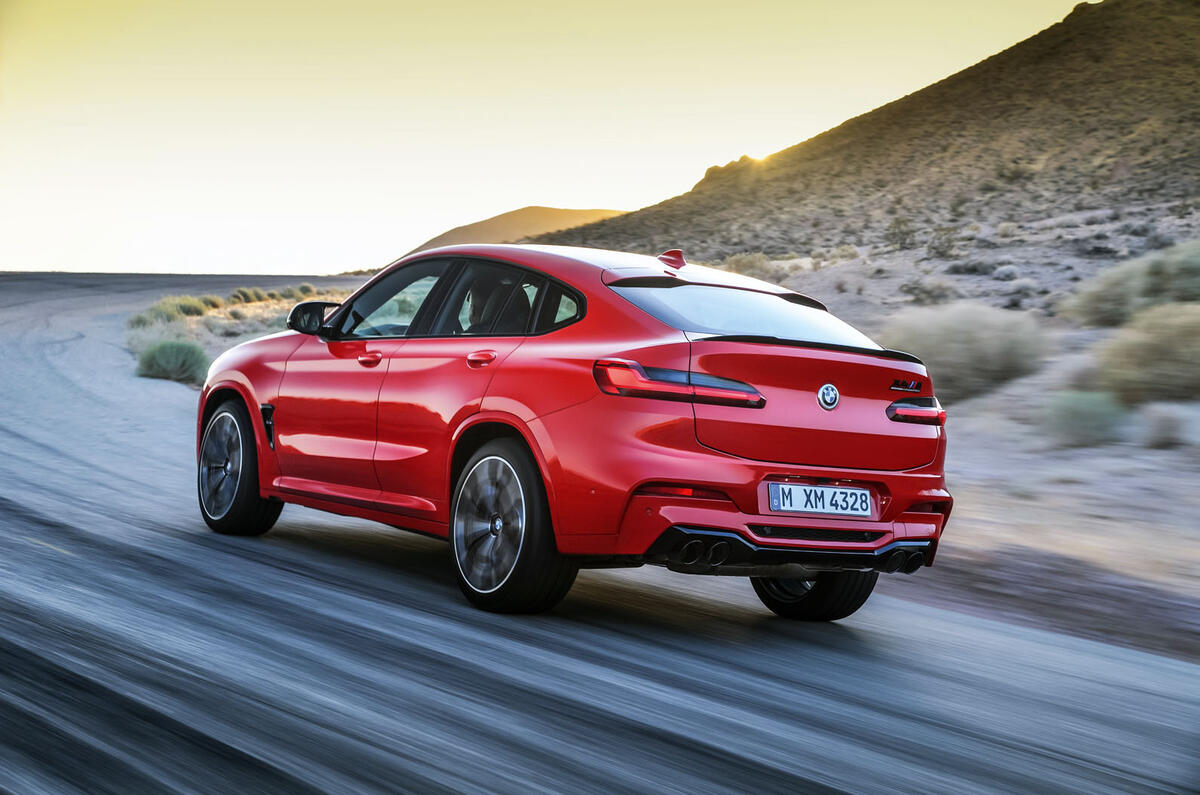 BMW X4M official press - on the road rear