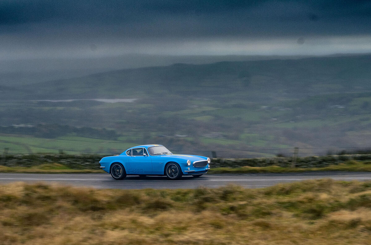 Cyan Volvo P1800 drive - on the road side Cyan Volvo P1800 drive - on the road side