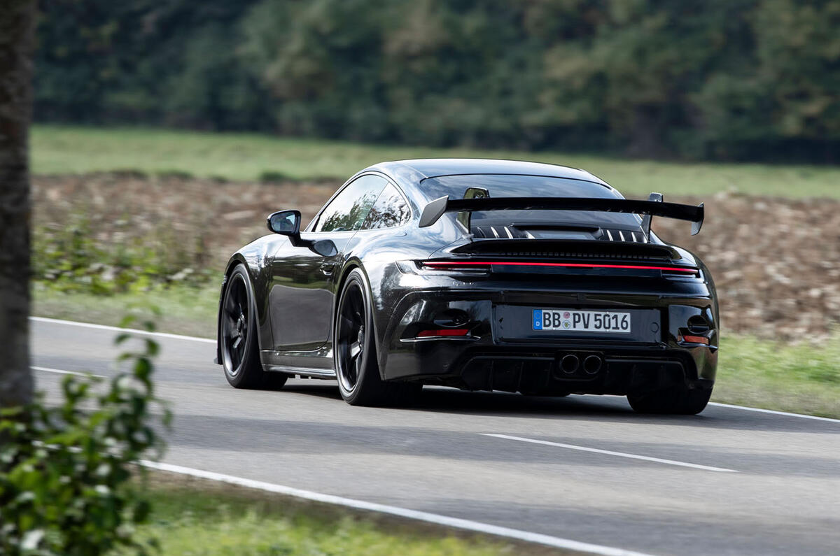 Porsche 911 GT3 2021 passenger ride - on the road rear Porsche 911 GT3 2021 passenger ride - on the road rear