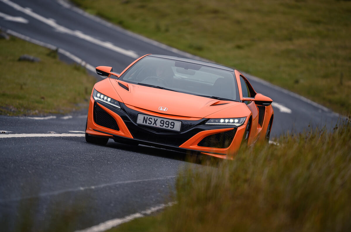 Honda NSX hybrid supercar feature - on the road front Honda NSX hybrid supercar feature - on the road front