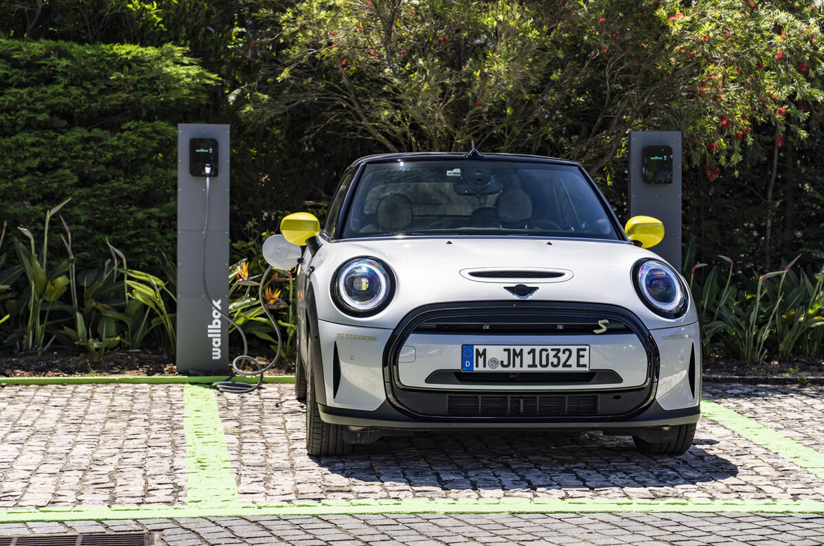 88 new Mini Cooper Convertible plugged into charger 88 new Mini Cooper Convertible plugged into charger