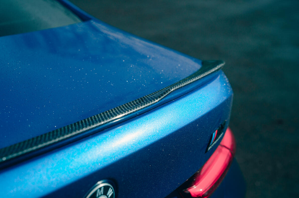 89 BMW M3 vs Audi RS3 saloon 2021 M3 spoiler