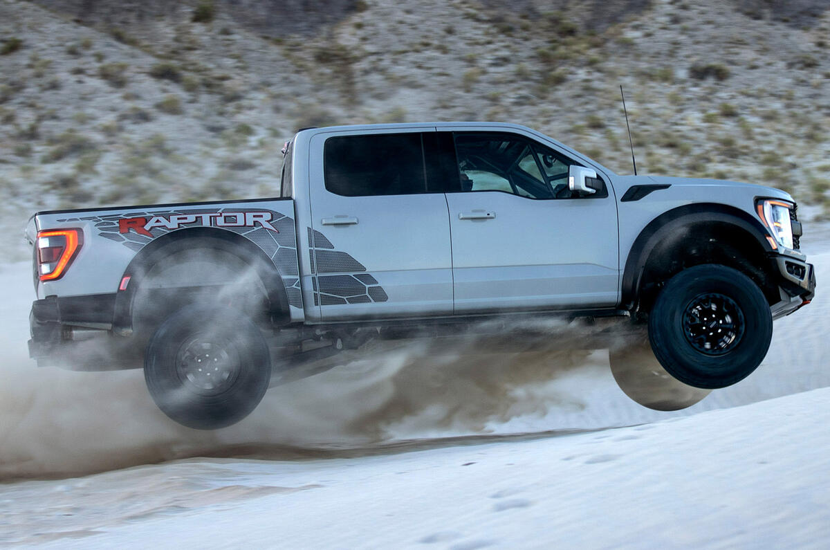 90 2023 F 150 Raptor R exterior Avalanche Gray jumping