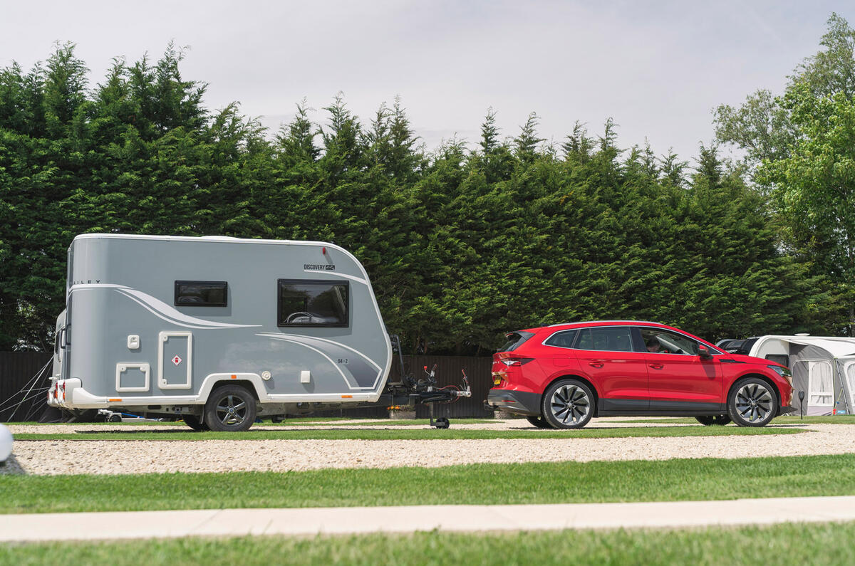 90 skoda enyaq iv 80 towing caravan side view 90 skoda enyaq iv 80 towing caravan side view