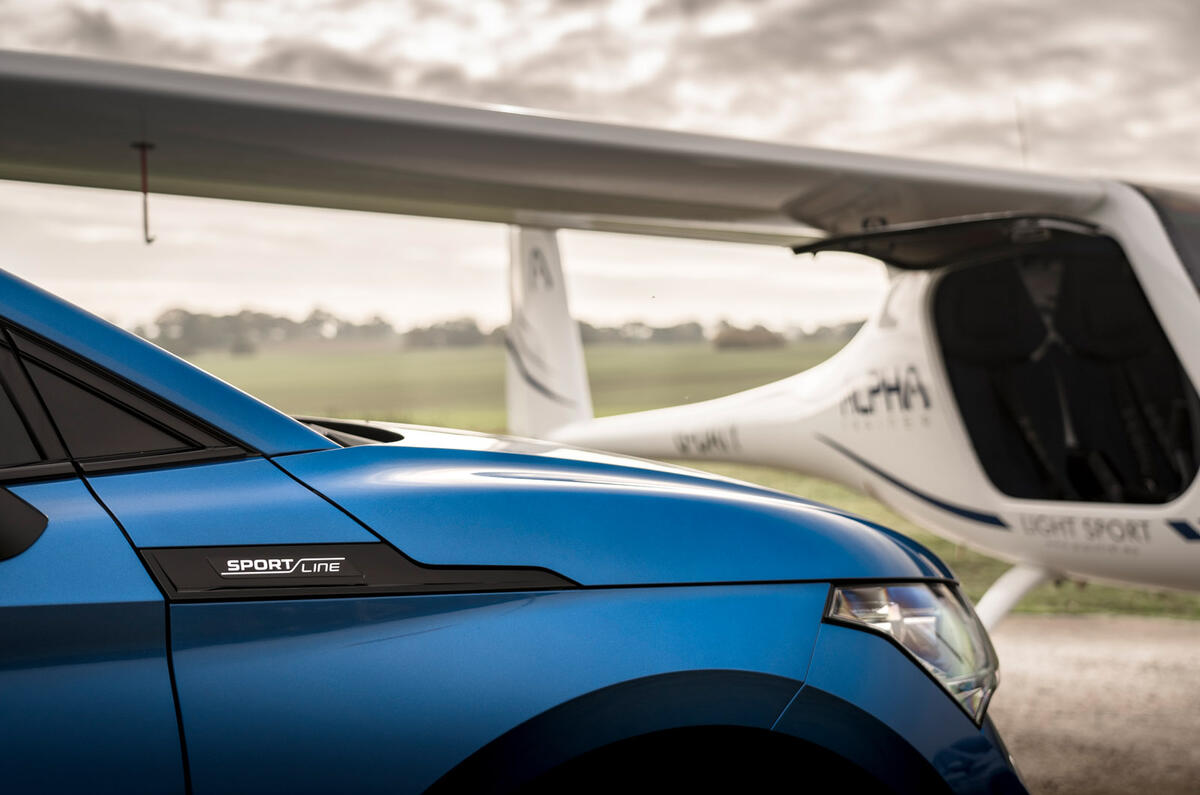 91 Skoda Enyaq vs electric plane 2022 enyaq front badge 91 Skoda Enyaq vs electric plane 2022 enyaq front badge