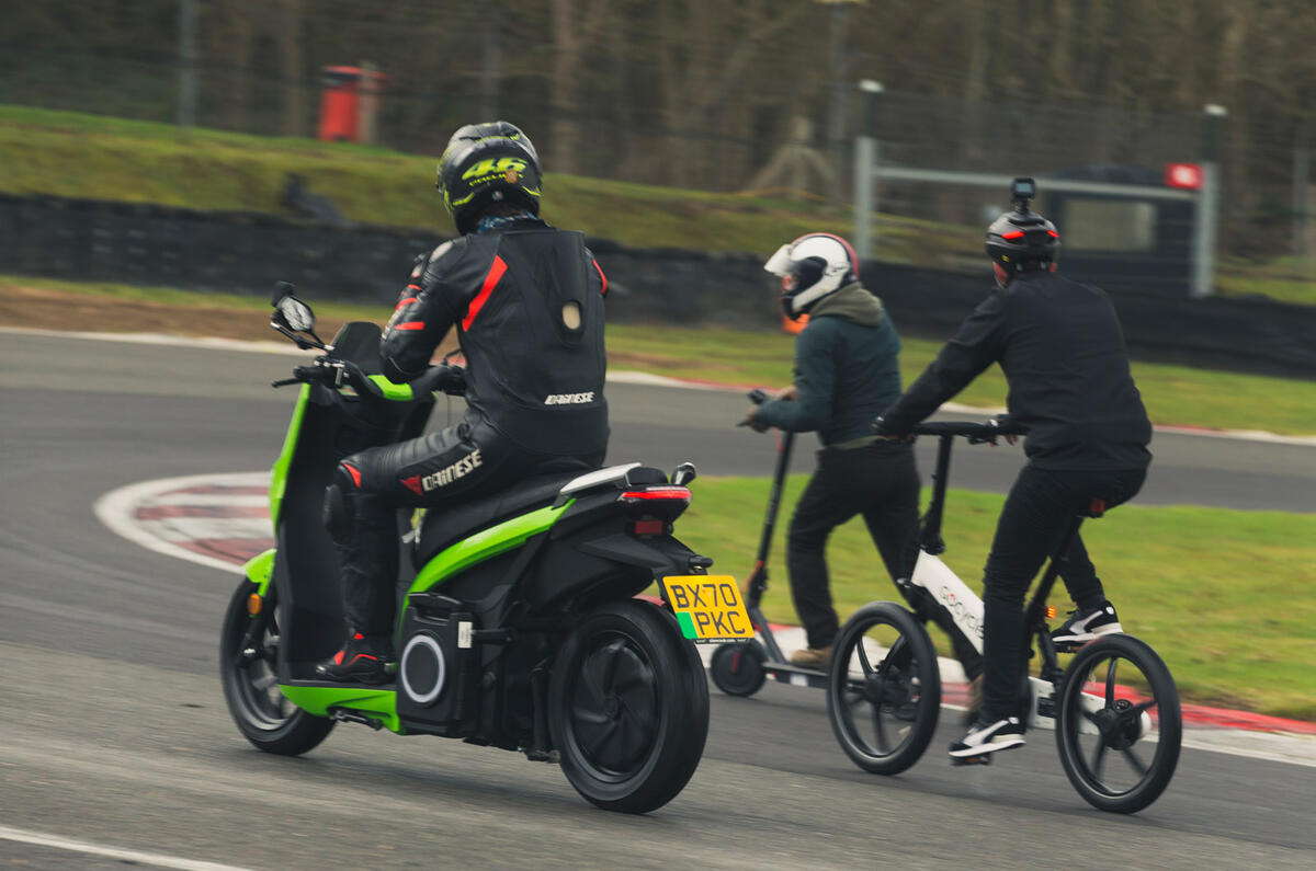 92 Brands Hatch EV records feature trio cornering rear
