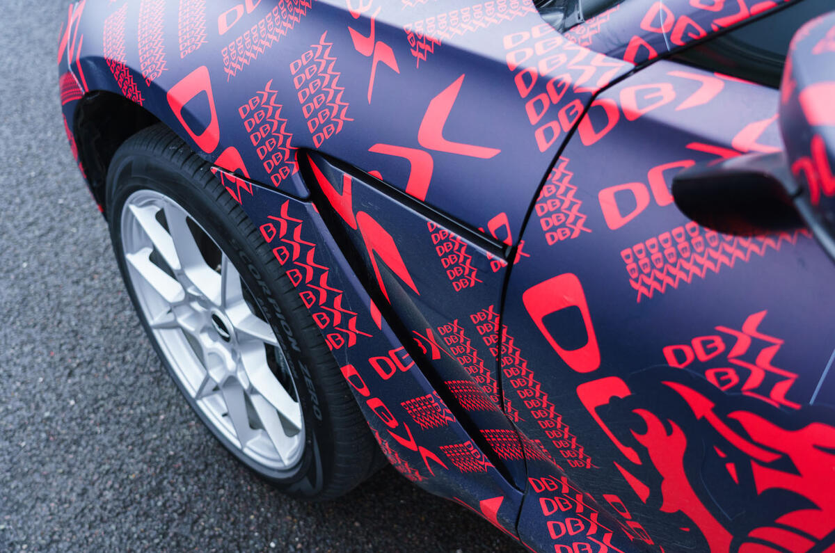 2020 Aston Martin DBX camouflaged prototype ride - side aero