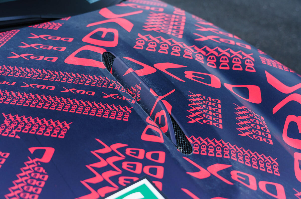 2020 Aston Martin DBX camouflaged prototype ride - bonnet vent