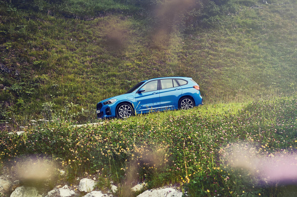 BMW X1 PHEV official press photos - on the road side
