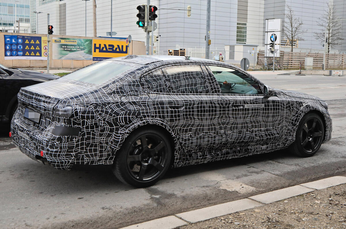 94 2024 BMW M5 hybrid spy images driving 94 2024 BMW M5 hybrid spy images driving