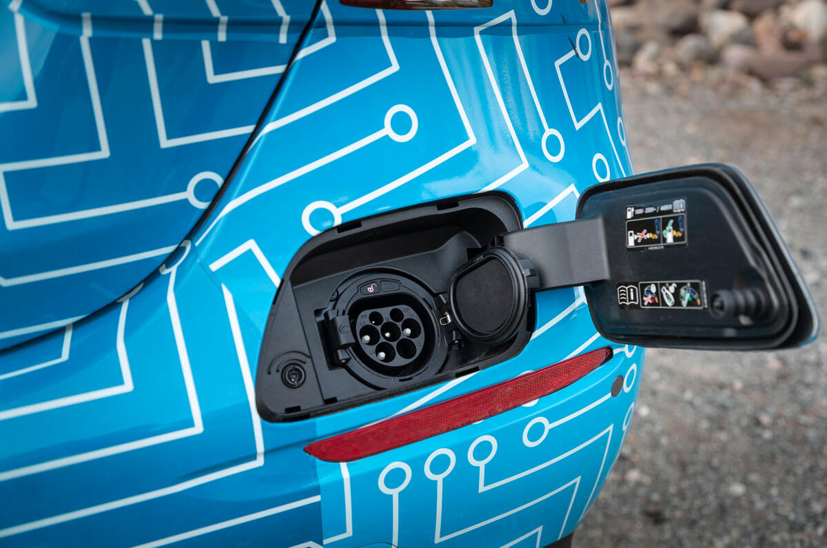 Mercedes-Benz E-Class 2020 prototype ride - charging plug Mercedes-Benz E-Class 2020 prototype ride - charging plug