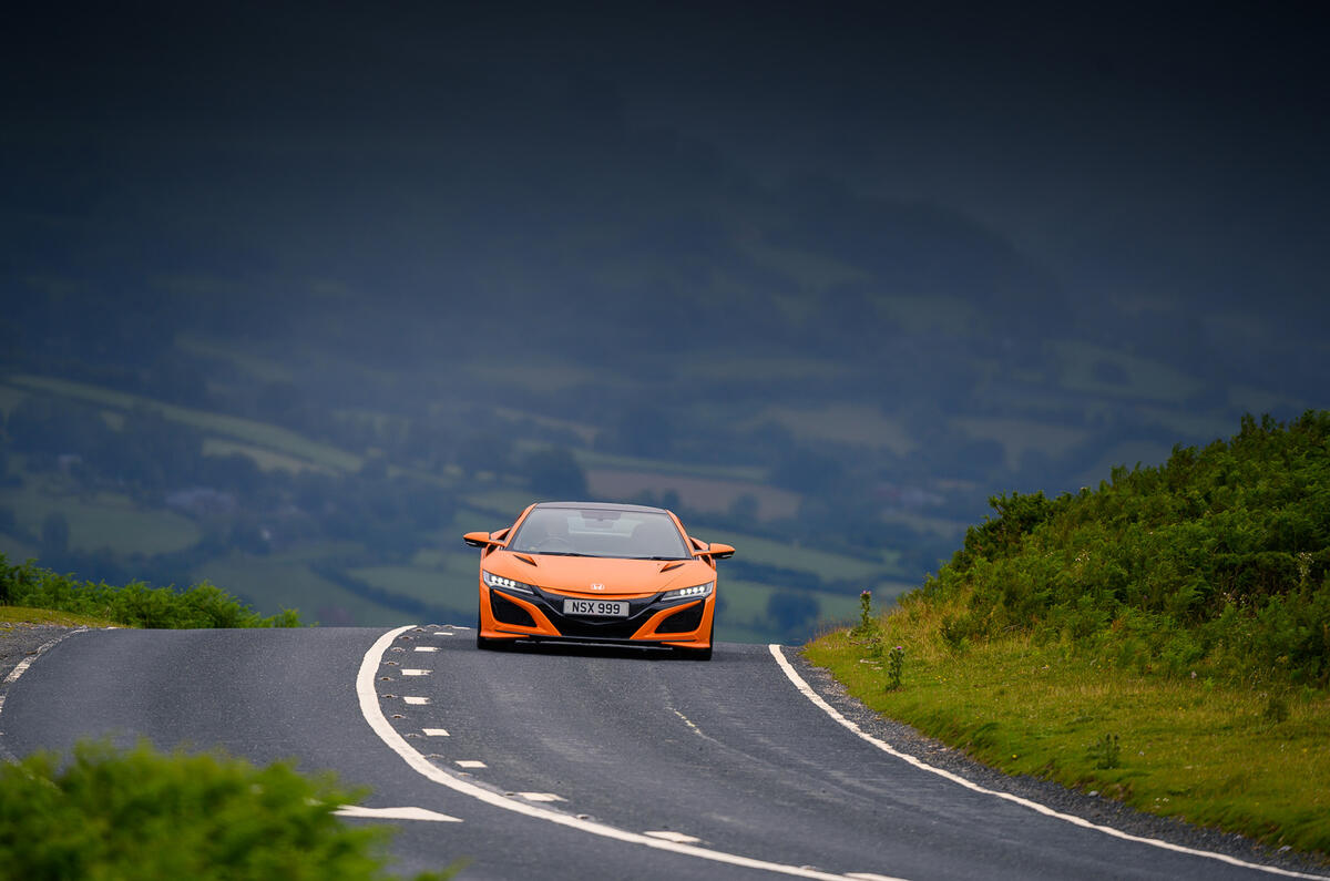 Honda NSX hybrid supercar feature - road front Honda NSX hybrid supercar feature - road front