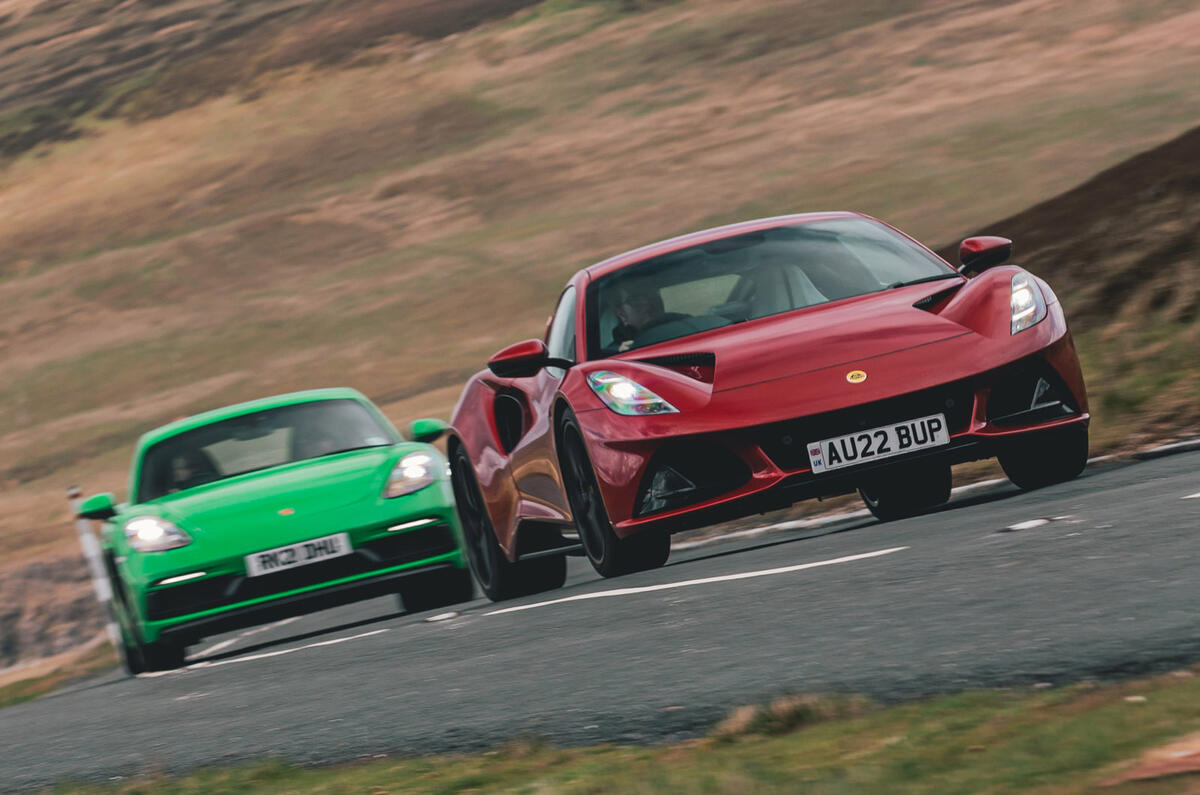 96 lotus emira porsche cayman gts front cornering 96 lotus emira porsche cayman gts front cornering