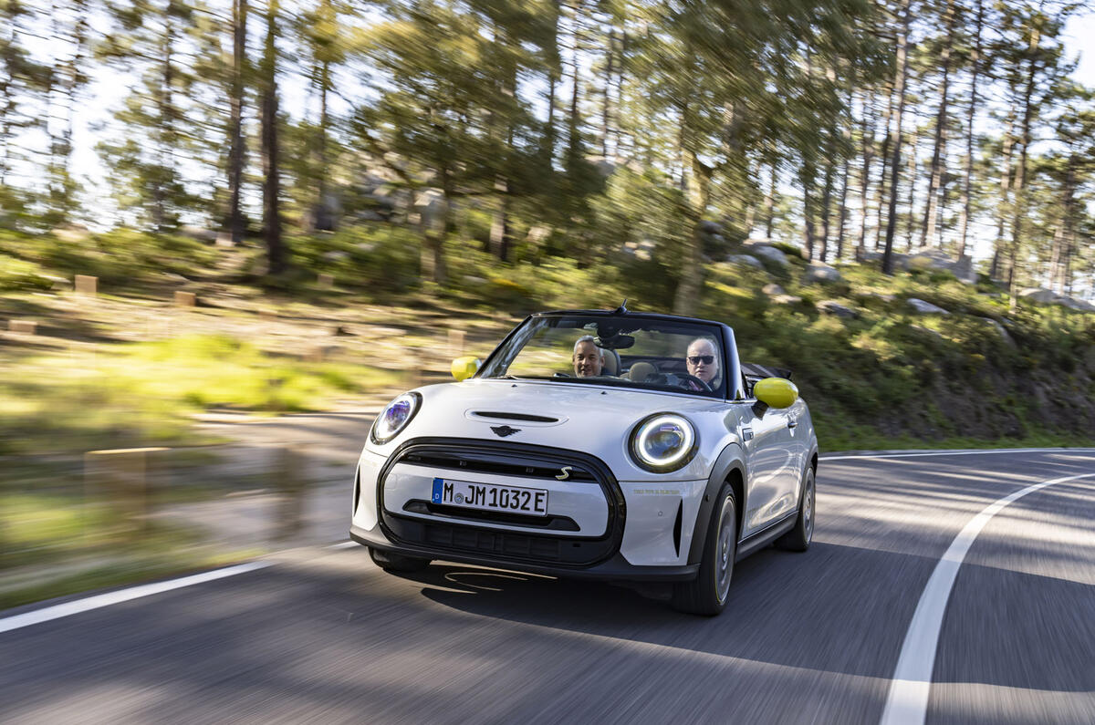 96 new Mini Cooper Convertible front angle forest 96 new Mini Cooper Convertible front angle forest