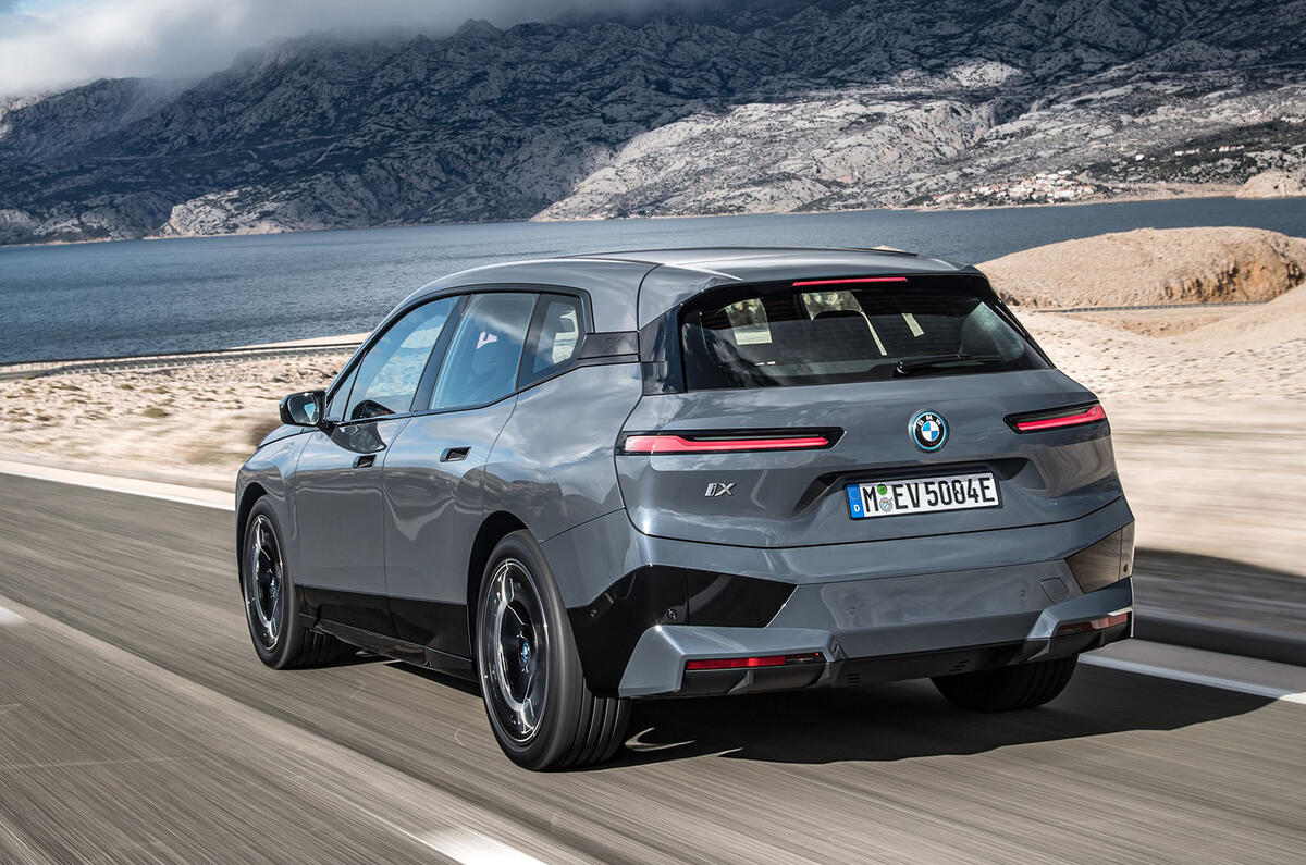 97 BMW iX prototype ride 2021 hero rear