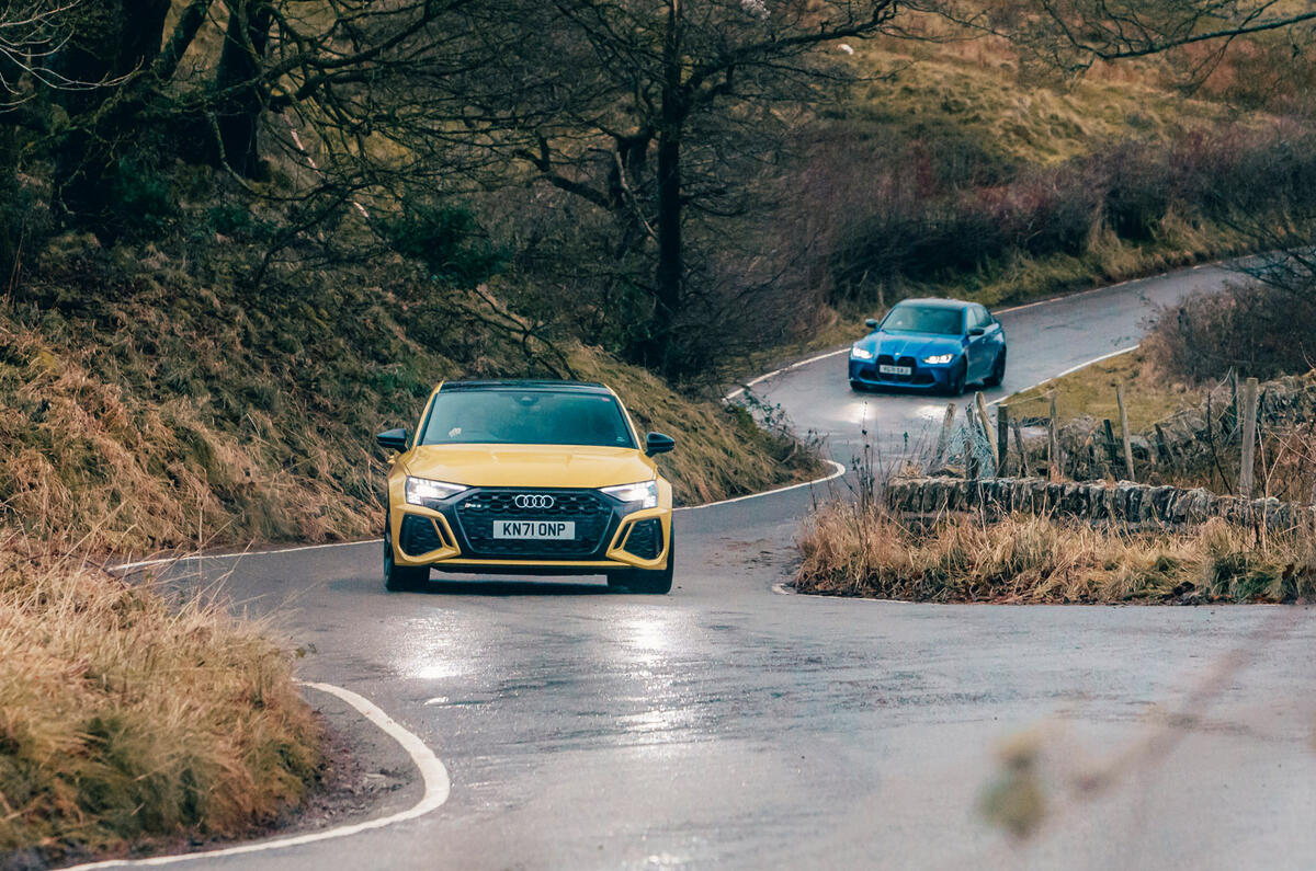 97 BMW M3 vs Audi RS3 saloon 2021 on road front