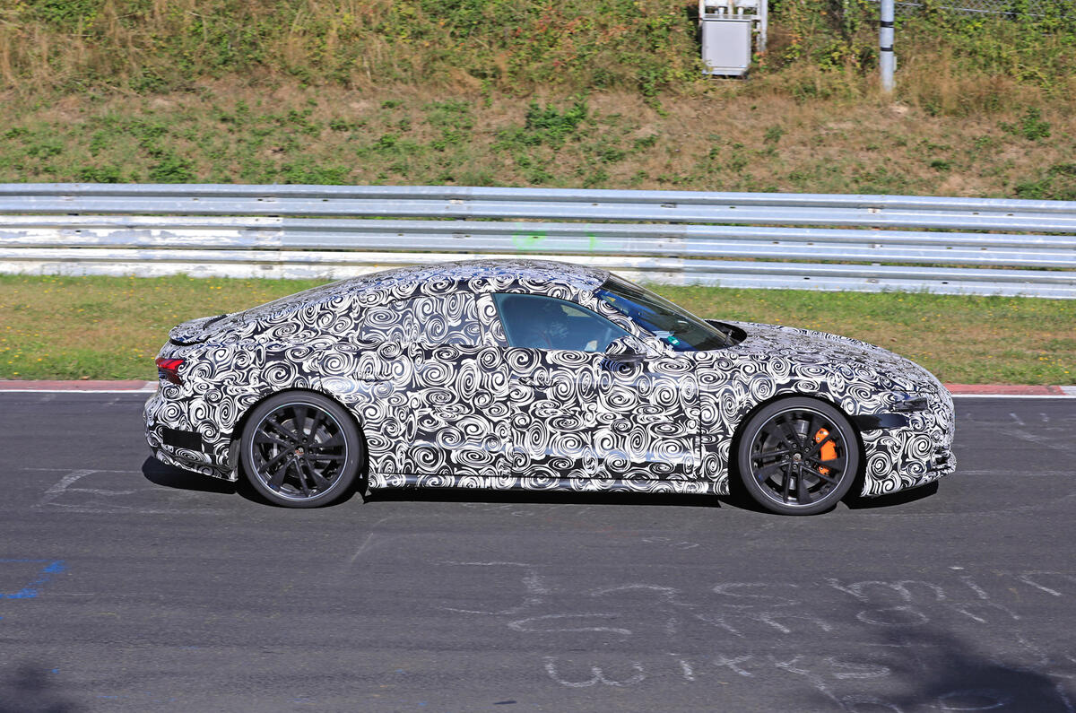 Audi E-tron GT camo track driving - side