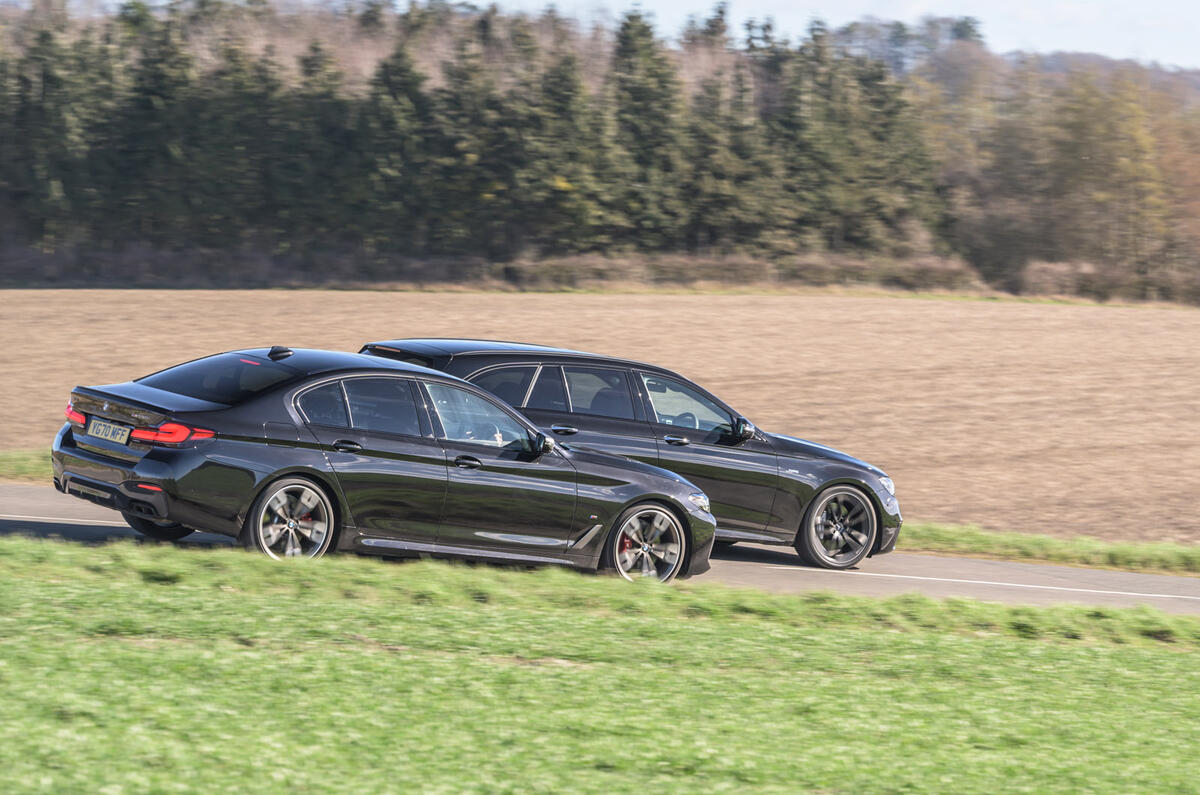 98 bmw m550i vs mercedes amg e53 2021 twin test hero rear 98 bmw m550i vs mercedes amg e53 2021 twin test hero rear