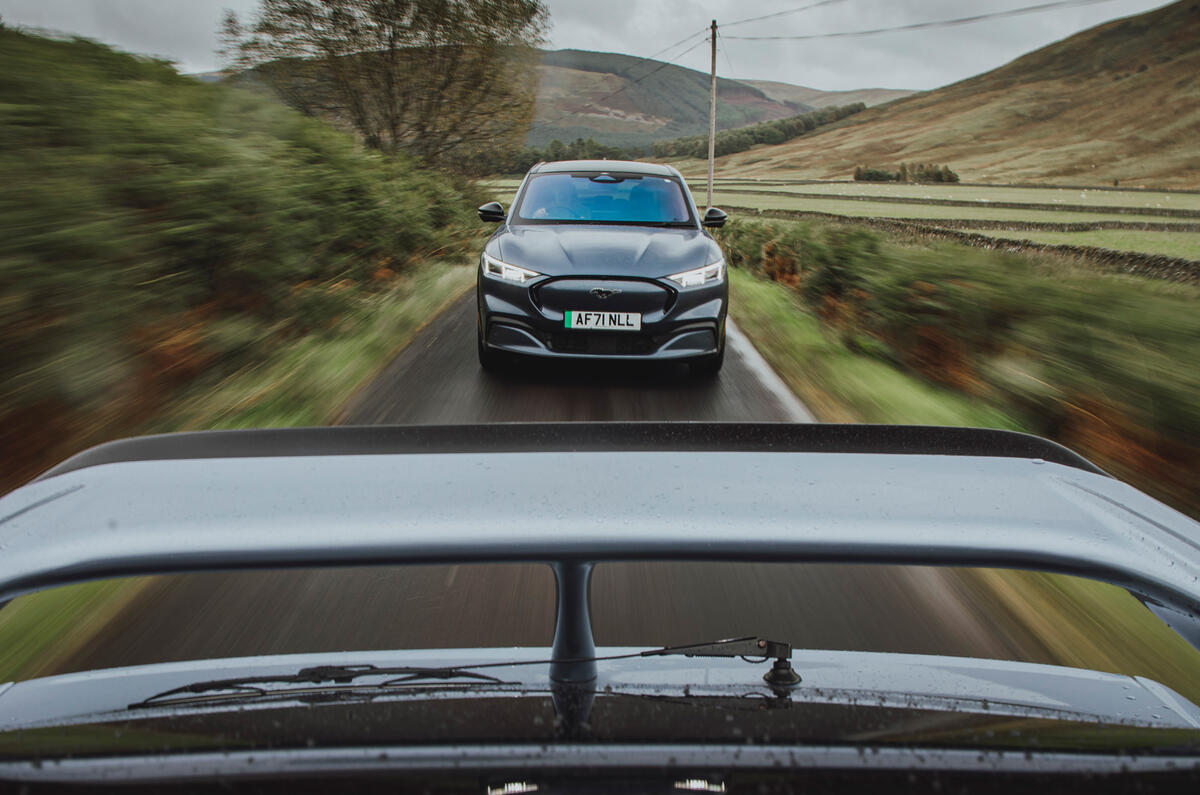 98 Ford Mustang Mach e vs Sierra Cosworth tracking front 98 Ford Mustang Mach e vs Sierra Cosworth tracking front